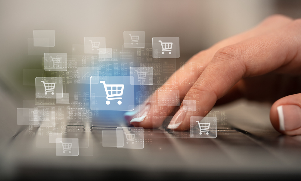 Business woman hand typing on keyboard with online shopping concept-1 Business woman hand typing on keyboard with online shopping concept-1