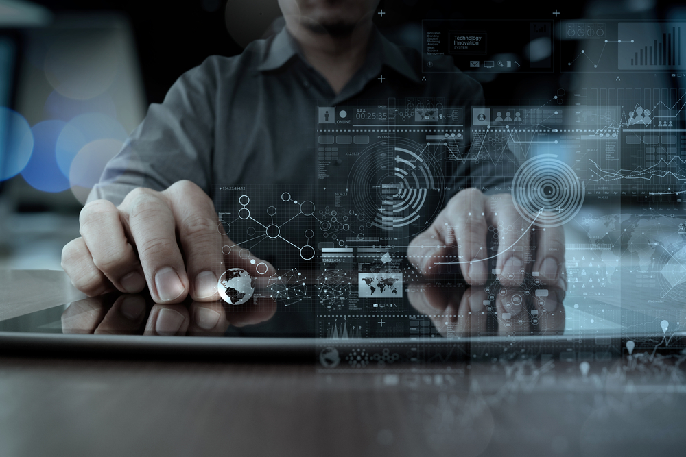 businessman hand working with modern technology digital tablet computer and graphics layer effect as business strategy concept businessman hand working with modern technology digital tablet computer and graphics layer effect as business strategy concept